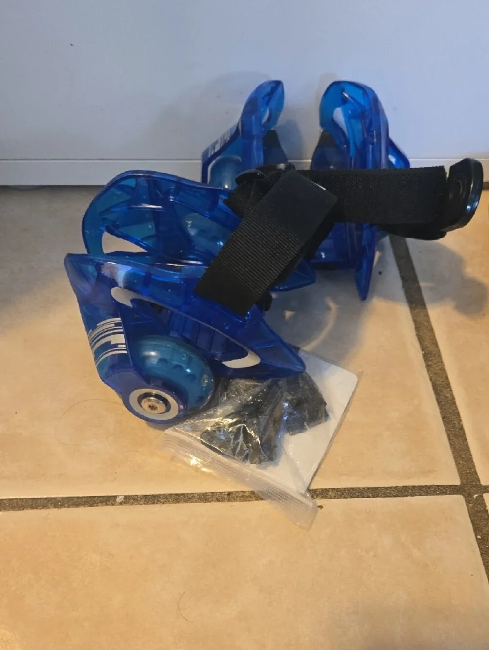 Razor Blue LED Heel Wheels with Black Straps